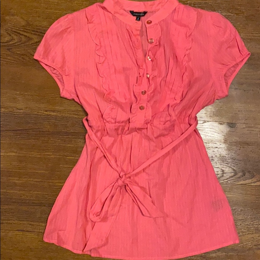 Pink blouse with ruffles